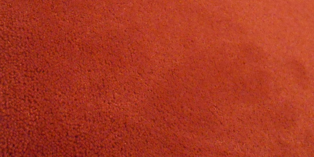 Tapis sur mesure rouge